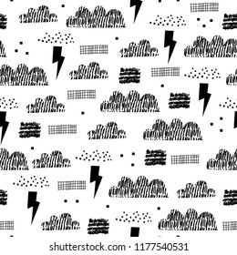 Childish seamless pattern of clouds, lightning and rain. Perfect for kids fabric, textile, nursery wallpaper. Vector Illustration.