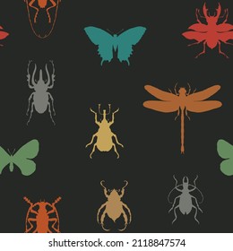 Childish seamless pattern with colored silhouettes of various insects. Repeating vector background with butterflies, beetles, dragonfly on a black backdrop. Wallpaper, wrapping paper or fabric design