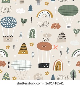 Childish seamless pattern with cute balloons, clouds, hills and trees for baby apparel, cloth texture, textile or decoration. Pastel colors.