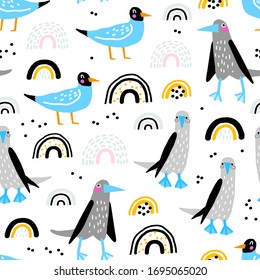 Childish seamless pattern with cute birds. Creative childish texture for fabric, wrapping, textile, wallpaper, apparel. Blue gannets, gulls and rainbows. Vector illustration.