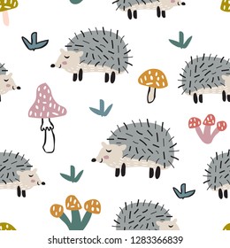 Childish seamless pattern with cute hedgehog and mushrooms. Creative texture for fabric, textile.