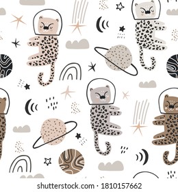 Childish seamless pattern with cute leopards in the space. Modern kids texture with cosmic elements, planets, moon, stars. Perfect for kids products, textile, apparel.