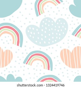 Childish seamless pattern with cute rainbows, raindrops, clouds in the sky. Cute cartoon background. Perfect for fabric, textile, wrapping.Vector Illustration - Vector