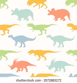 Childish seamless pattern with dinosaur silhouettes. Backgrounds and wallpapers for invitations, cards, fabrics, packaging, textiles, posters. Vector illustration.