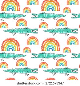 Childish seamless pattern with hand drawn crocodiles and rainbows. Animals of the jungle. For fabric, textiles and other surfaces. Creative vector background