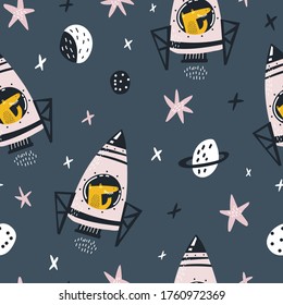 Childish seamless pattern with hand drawn space elements, rocket, star, planet. Alligator in space. Trendy kids vector background. Dark background.