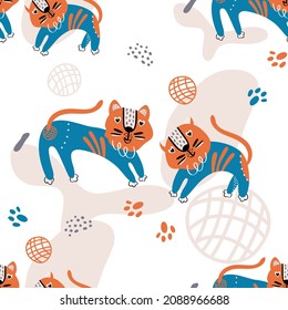 Patrón infantil sin costuras con tigres lindos dibujados a mano. Fondo de vectores escandinavo a la moda. Perfecto para prendas de vestir, tela, carteles, tarjetas, camisetas, textiles, decoración de vivero, papel envolvente