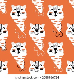 Childish seamless pattern with hand drawn cute tigers. Trendy Scandinavian vector background. Perfect for kids apparel, fabric, posters, cards, t-shirts, textile, nursery decoration, wrapping paper