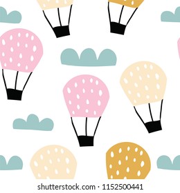 Childish seamless pattern with hot air ballon in the sky. Cute cartoon background. Perfect for fabric, textile, wrapping.Vector Illustration