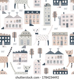 Childish seamless pattern with old buildings and cute cats. Good for kids fabric, textile, nursery wallpaper. Seamless city landscape. Funny cats walk around the city. Kids pattern.