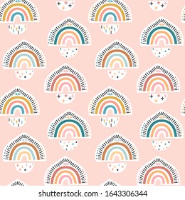 Childish seamless pattern with rainbow. Creative boho kids vector texture for fabric, wrapping paper, textiles, wallpaper, clothing. Trendy background. Hand drawn vector illustration