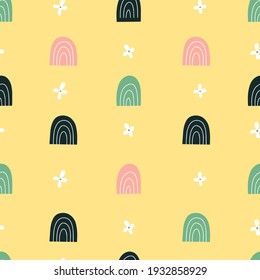 Childish seamless pattern with rainbow. Vector illustration.