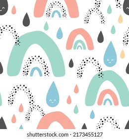 Childish seamless pattern with rainbows, rain drops and dots. Creative kids texture for fabric, wrapping, textile, wallpaper and apparel design. Vector illustration.