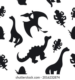 Childish seamless pattern with silhouette dinosaur and tropical leaves on a black background. Cute dino design.
Perfect fit for nursery clothes, fabric,  wrapping paper, wallpaper, textile design.