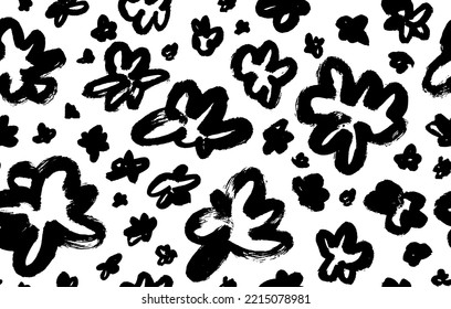 Childish style flowers seamless pattern. Abstract botanical elements. Brush drawn black floral silhouettes. Graphic sketch drawing of small daisies, simple chamomiles. Black ink illustration.