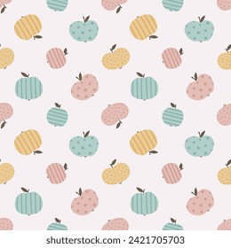 Childish vector seamless pattern with cute hand drawn colorful apples limited to a gender neutral palette.