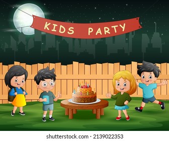 The children at a birthday party in the backyard at night	