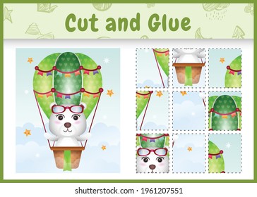 Children board game cut and glue with a cute polar bear on hot air balloon