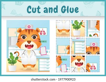 Children board game cut and glue with a cute tiger using costume nurses