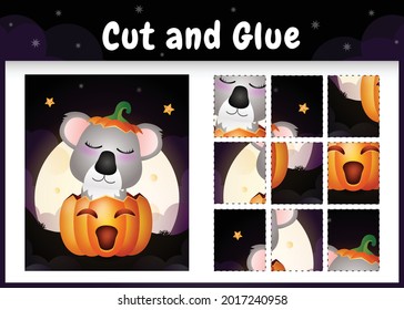 Children board game cut and glue with a cute koala in the halloween pumpkin