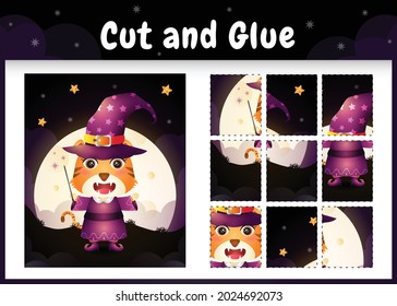 Children board game cut and glue with a cute tiger using halloween costume