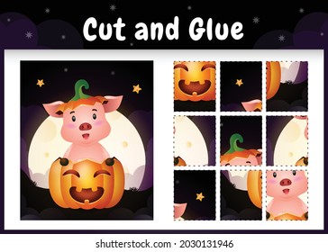Children board game cut and glue with a cute pig in the halloween pumpkin