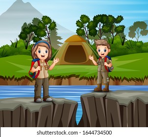 Children camping out by the river