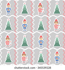 Children in caps of Santa Claus on a white background and Christmas tree