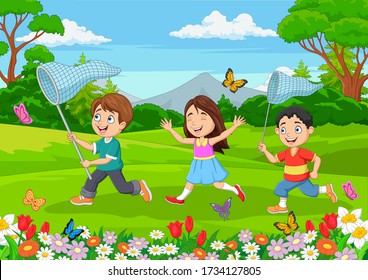 Children catching a butterfly in the park