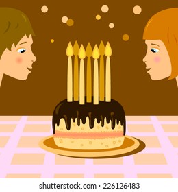 Children celebrate birthday and make wishes blowing out candles on the cake at the table.