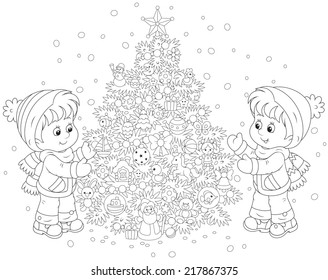 Children and Christmas tree