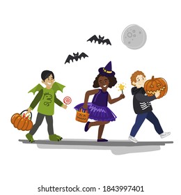 Children in costumes go to celebrate Halloween. Children's party masquerade. People at the holidays