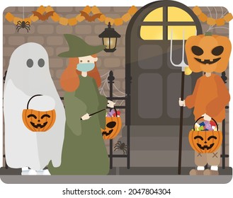 children dress up Trick or treat in front of a stranger's house on Halloween night.