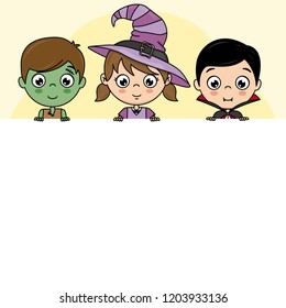 children dressed as halloween with poster. blank space for text