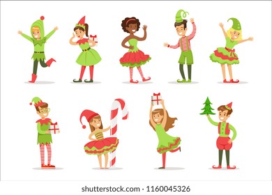 Children Dressed As Santa Claus Christmas Elves For The Costume Holiday Carnival Party