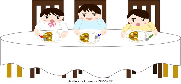 Kinder, die Curry-Reis am Tisch essen
