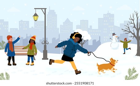 Children enjoy a snowy day while walking a dog and making a snowman in the city park