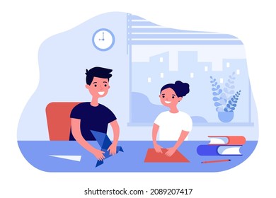 Children folding origami, making paper toys at table. Boy teaching girl flat vector illustration. Creative craft hobby, activity at home concept for banner, website design or landing web page