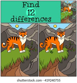 Children games: Find differences. Cute little tiger stands on the hill and smiles.