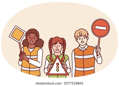 Children learning rules of road wear reflective vests and display traffic sign to help pedestrians and drivers. Schoolchildren play traffic inspectors to learn rules of moving around city