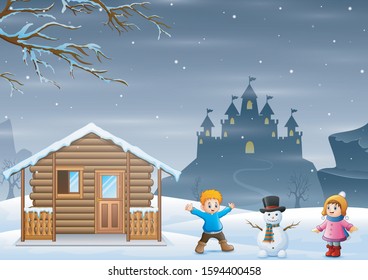 Children making snowman in snowy landscape