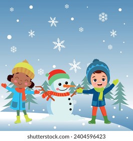 Children making snowmen playing outdoors in winter