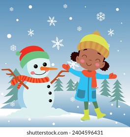 Children making snowmen playing outdoors in winter