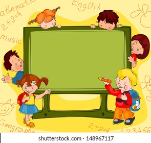 Children on the background of the school board. Place for text