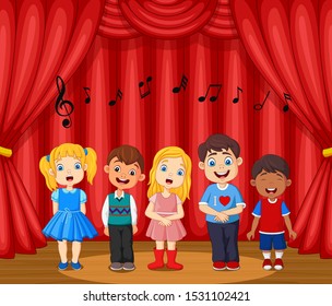 Children performing singing on the stage