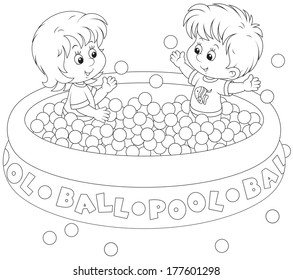 Children play in a ball pool