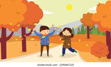 children play with fallen leaves