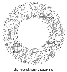 Children play music. Musical education, theatre, school.