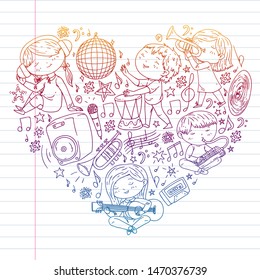 Children play music. Musical education, theatre, school.