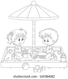 Children play in a sandbox